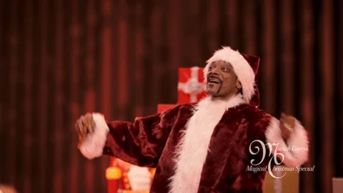 Snoop dressed as Santa, dancing - GIF